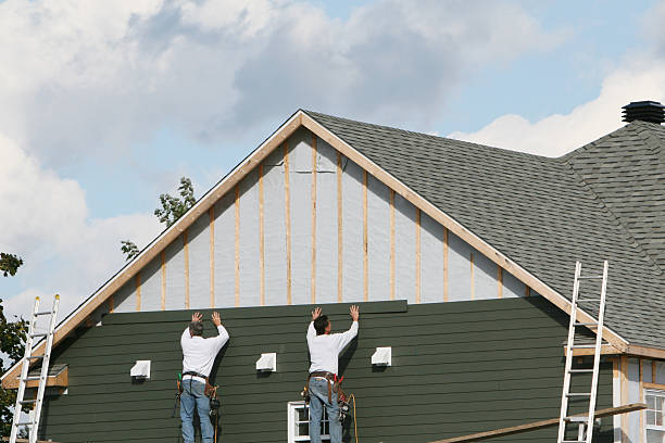 Professional Siding technician working in Manchester, MD